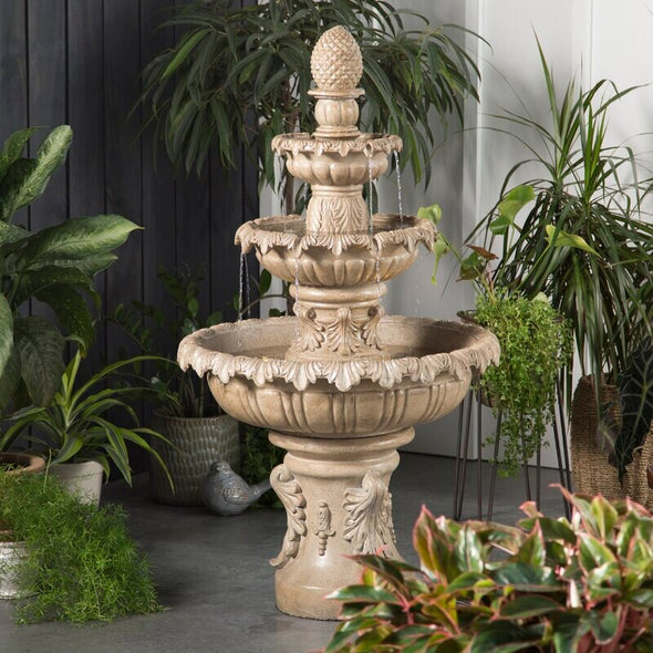 Sandstone Danelle Resin Outdoor Fountain with Light 3-Tiers That Send Water Flowing Pineapple-Shaped Bubbler at Top of a Fountain