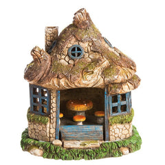 Solar Powered Lawn Ornament Wooden Table and Chairs Inside. The Outside Lantern and Windows Glow At Night with a Ligh