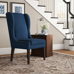 Wingback Chair Adds Stately Style To Any Living Room or Den Four Tapered Legs and Features Neutral-Hued Polyester