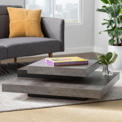 Concrete/Pure Black Akrati Coffee Table Supports up to 33 lbs. Fusing Function and Sculptural Style